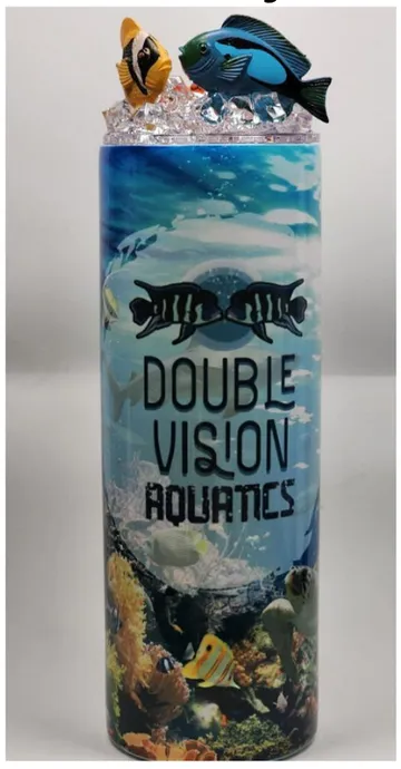 Salt Life tumbler — underwater reef scene wrap with the DVA logo and toy marine fish decorating the lid